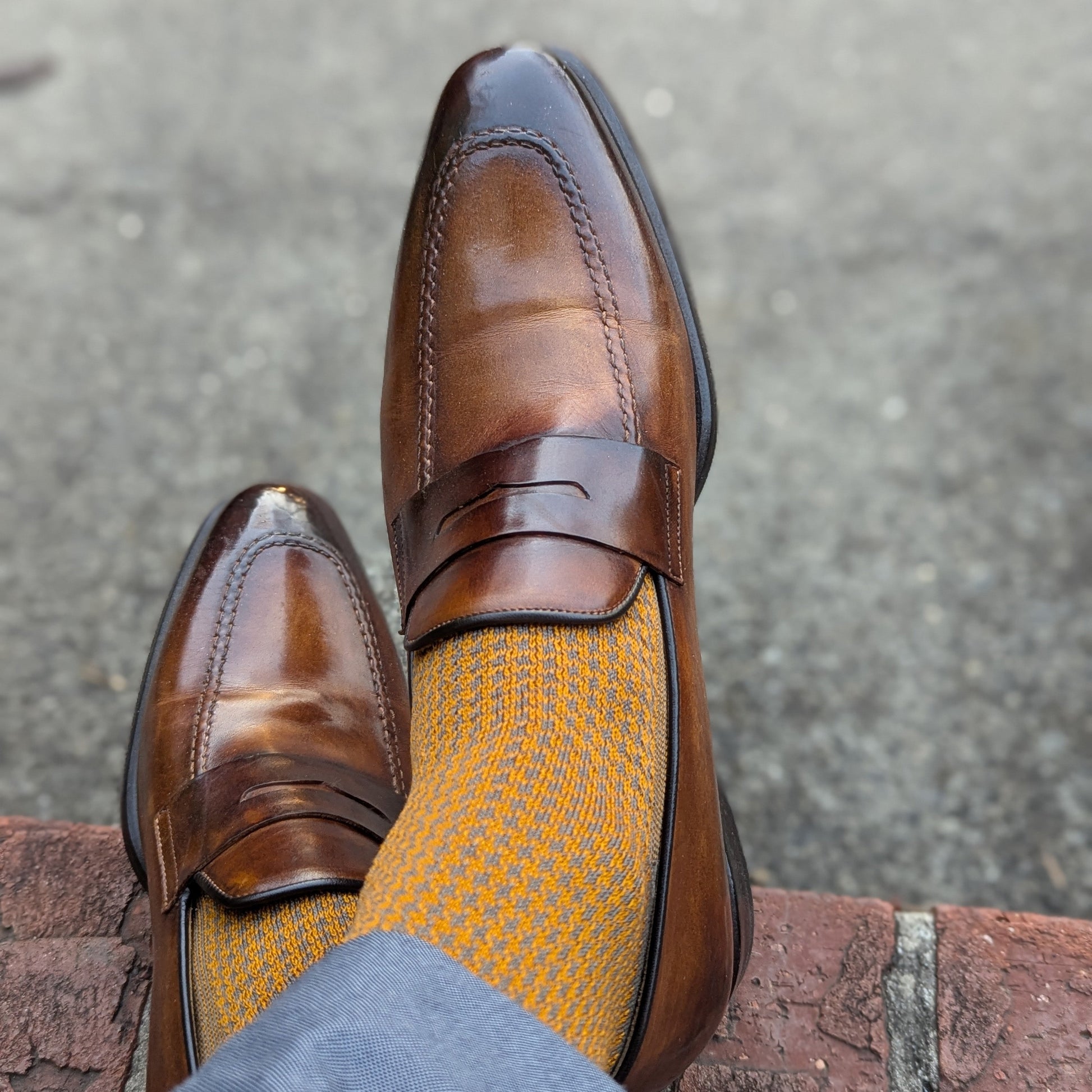 Michael Darren Houndstooth over the calf men's dress sock, Egyptian Cotton in Mustard and Mushroom, worn on foot with Michael Darren Penny Loafer in Oak Brown Patina