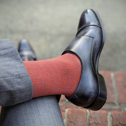 Michael Darren Houndstooth over the calf men's dress sock, Egyptian Cotton in Orange and Grey, worn on foot with Michael Darren Double Monkstrap in Smoke Grey Patina